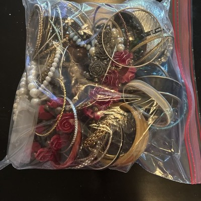 Gallon Bag, Full Of Different Bracelets