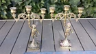 Antique Pair of 3 Light Metal Cherub Decorated Candlesticks.
