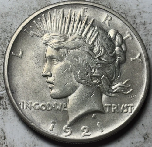 1921 $1 High Relief Peace Silver Dollar. Attractive AU Example!