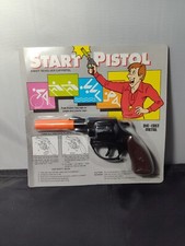 Vintage NOS Toy Die Cast Metal Cowboy Cap Gun in sealed Package "Start Pistol"