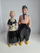 Ceramic decanters titled 'Dutch Couple in Traditional Costume' by Bols 