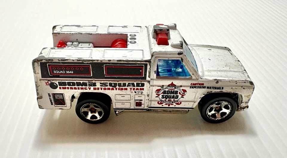 Camión de emergencia Hot Wheels Bomb Squad 1974 vintage pared negra Mattel diecast Foto 3 de 4