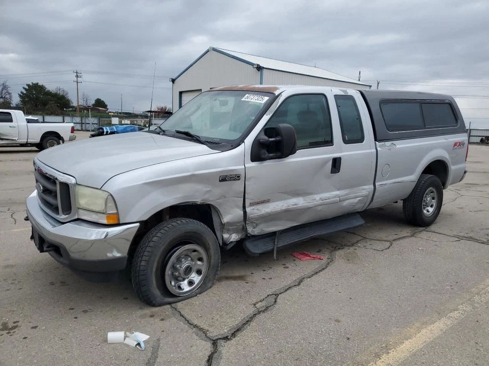 Faro halógeno de haz sellado para pasajero OEM, se adapta a camioneta Ford F250SD 99-04 136526 Foto 2 de 4