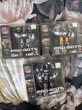 TOM BRADY 2009 NFL PRO-BOT, BRETT FAVRE 4, DARREN McFADDEN 20