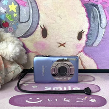Canon IXUS 105 Compact Digital Camera 12.1MP Silver 4X Optical Zoom Blue English