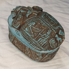 Antique Egyptian scarab-shaped pharaonic box made of stone. Pharaonic box