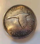Canada Silver Dollar 1867-1967 Commemorative Goose Elizabeth II Circulated