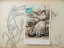 Antique postcard fantasy April 1st - Woman with Fish Village