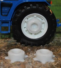 BRITAINS 1/32 ,WHEEL WEIGHTS FOR FORD 7600 / NEW TW35 TRACTOR,PAIR WEIGHTS ONLY