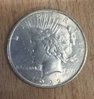 1922 P Peace Silver Dollar - 90% Silver - 1 OZ AU-55 Rainbow tone on reverse.