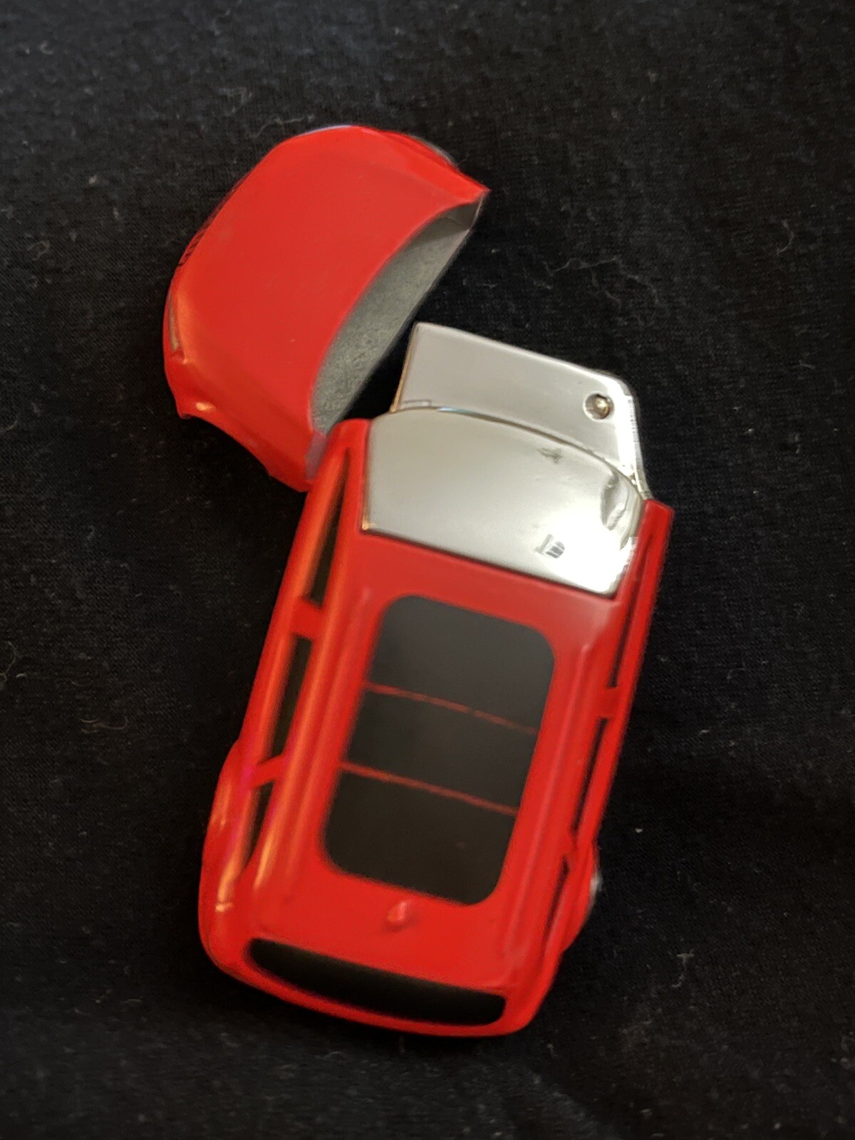 Novelty Lighter Sports Car Refillable - 2 wheels and tube of super glue included
