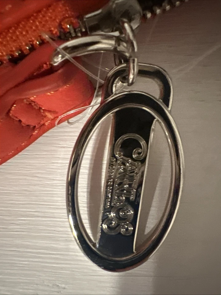 monedero carlos santana Foto 4 de 4