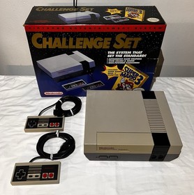 Nintendo NES Challenge Set Console With 12 Games And Cleaning Kit.