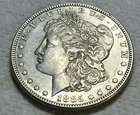 1885 P - Morgan Silver Dollar. Estimated Almost Uncirculated 55. A1717