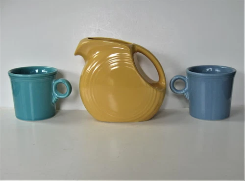 2  Fiesta Ware Coffee Mugs With Yellow Pitcher Ring Handle USA Vintage 