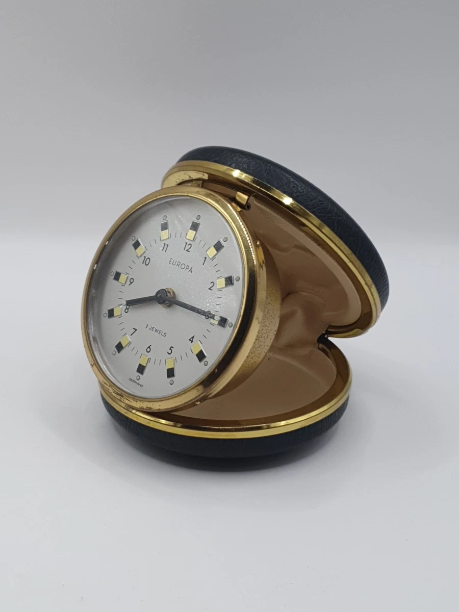 a vintage Europa 2jewels travel alarm clock in green,black