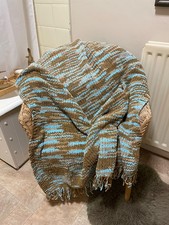 Chenille mocha colour throw, with fringed edging