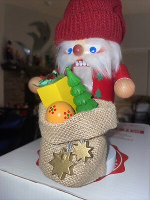 Steinbach nutcracker santa with green present bag