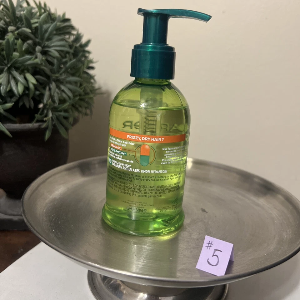 Suero antiencrespamiento Garnier Fructis elegante y brillante - 5,1 oz Foto 2 de 2