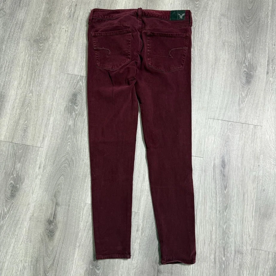 Pantalones ajustados American Eagle Jegging para mujer 4 cortos borgoña súper elásticos Foto 2 de 4