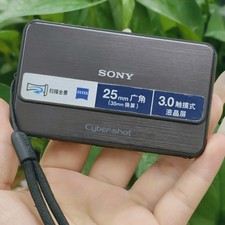 Sony Cyber-Shot DSC-T99 14.1MP Digital Camera 4x Zoom English Language