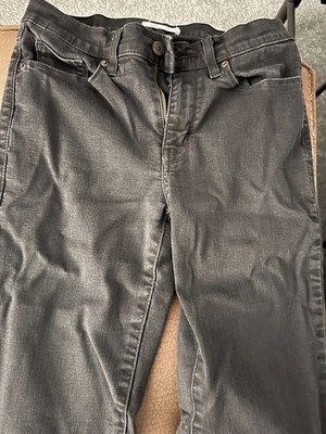 Women's Levi Jeans - Bootcut, worn, size 4.  3 pairs of black and 1 blue.