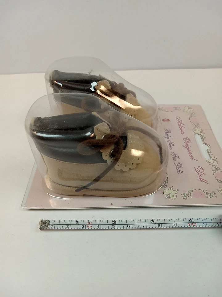 Muñeca Adora Original. Zapatos de bebé para muñecas. Foto 3 de 4