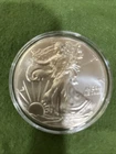 2014 -P BU ASE American Eagle 1 oz .999 Fine silver Lightly TonnedOn Reverse