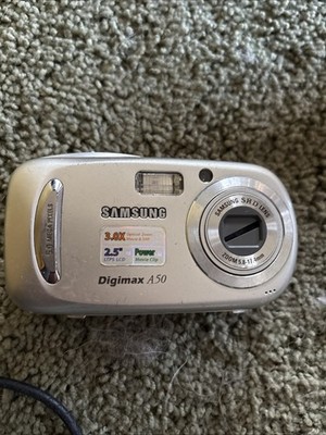 Samsung Digimax A7 7.0MP Digital Camera Silver Lanyard Pocket Camera