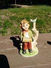 Ceramic Figurine Young Playing Hand Accordian to Bird 
