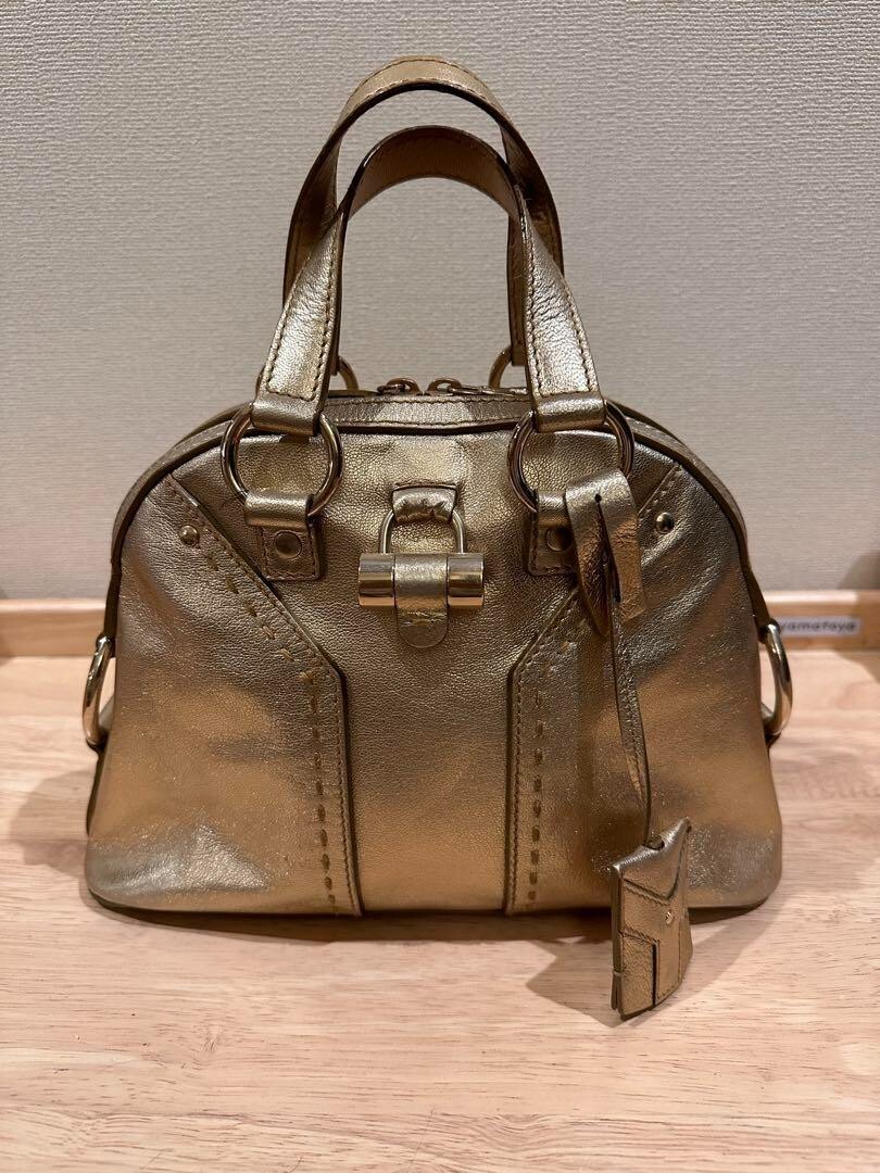 YVES SAINT LAURENT ミューズ　ハンドバッグ シャンパンゴールド Yves Saint Laurent Handbag Muse color Gold Leather pocket Women's