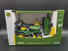 NEW Bruder 09824 John Deere Lawn Tractor with Trailer, Gardener Man & Plow 1:16