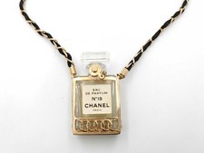 vintage CHANEL Perfume Necklace Gold chain with Perfume Dress