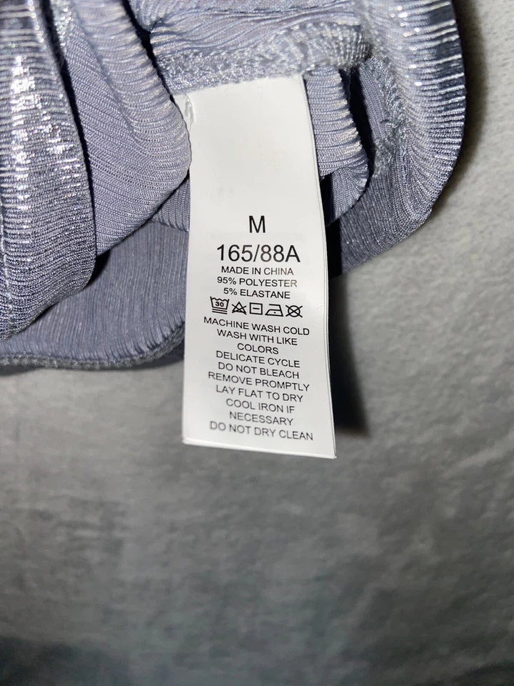 Camisa Kate Spade New York Plateada Metálica Elastizada Mezcla de Poli Cuello Alto Medio Foto 4 de 4