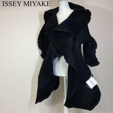 USED A MIRACULOUS DEADSTOCK ITEM: ISSEY MIYAKE 3D STEAM-PROCESSED COAT, BLACK.