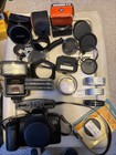 35MM Camera, Filter, Sunpak Flash, Caps And Accessories Lot