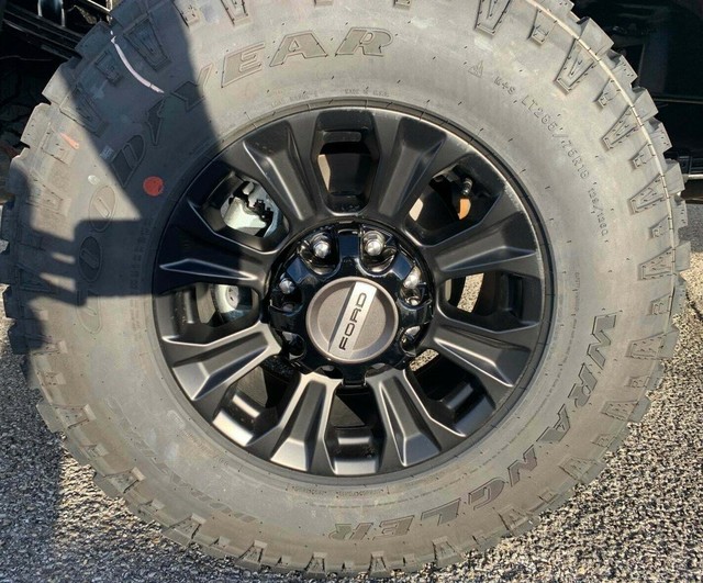 NEW 1720 Ford Super Duty TREMOR Black Front & Rear Center Cap Open Lug