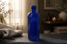 Vintage cobalt blue glass bottle with diamond patterned texture 6.5 Tall