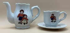 2 Piece Raggedy Ann  Andy Coffee Creamer  Coffee Cup With Saucer - Playset
