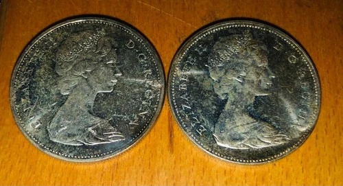 (2) Canadian 80%Silver $1 Dollar coins 1965, 1966 80% AU toned/mirror finish