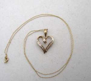 10K Yellow Gold 32 Diamond Baguette Heart Pendant Necklace 20"
