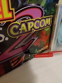 Marvel vs. Capcom 2, videogame w/manual & strategy guide book. sega dreamcast.