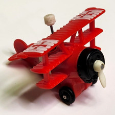 Vintage TOMY Wind Up Red Tri-Plane