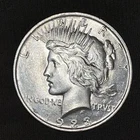 1923 PEACE SILVER DOLLAR .900 SILVER .100CU .7734 TROY OUNCES  SILVER  AU PHIL.