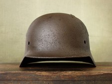 Elmetto tedesco originale WW2 WWII M40 / tasca Curlandia / con danni da battaglia