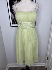 Eliza J green midi dress with beaded waist and flowy skirt. Size: 4