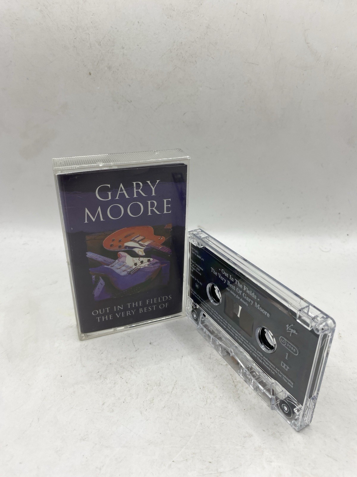 OUT IN THE FIELDS THE VERY BEST OF GARY MOORE CASSETTE TAPE ALBUM