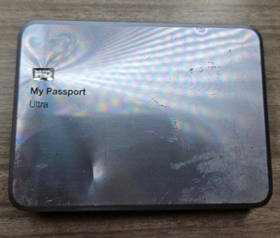 Western Digital My Passport Ultra Metal Edition (HAS A LOT OF DENTS) T25