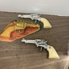 Three Pop Gun Pistols Western Style