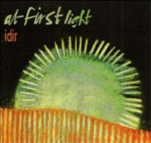 At First Light Idir (CD) Album